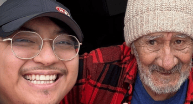 an H.E.B volunteer with a neighbor