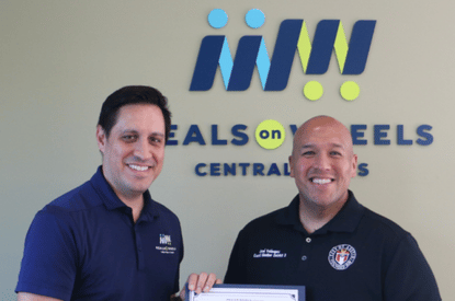 CEO Henry Van de Putte and Council Member José Velásquez